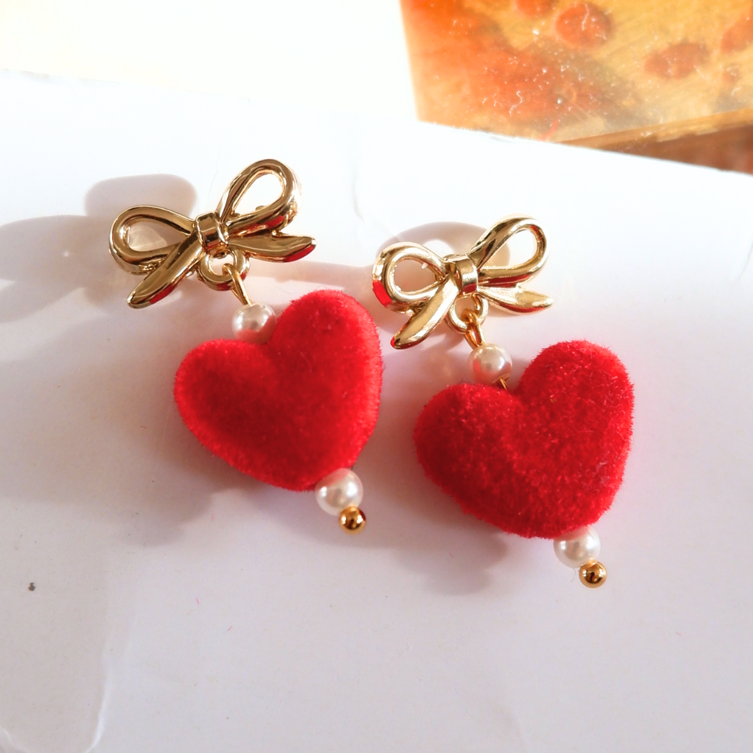 a little bit of love bow earrings